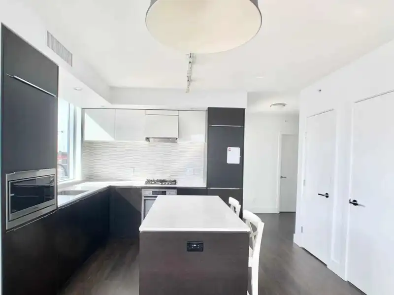 1202 5233 GILBERT ROAD - photo 3 of 11
