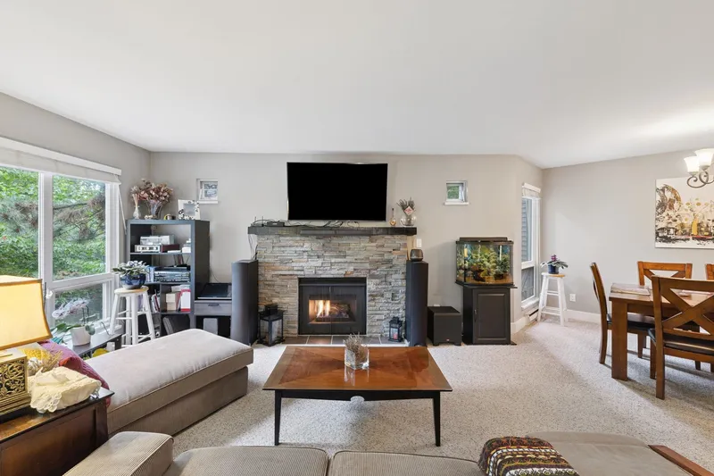 206 7459 MOFFATT ROAD - photo 1 of 25