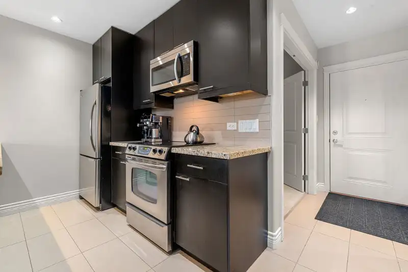 203 2970 KING GEORGE BOULEVARD - photo 4 of 39