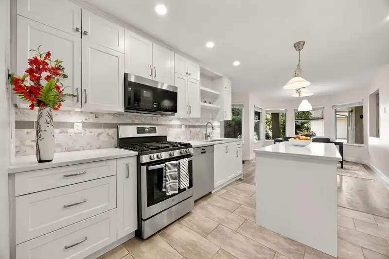 16 3471 REGINA AVENUE - photo 1 of 33