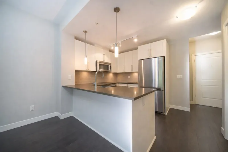 310 14358 60 AVENUE - photo 1 of 9