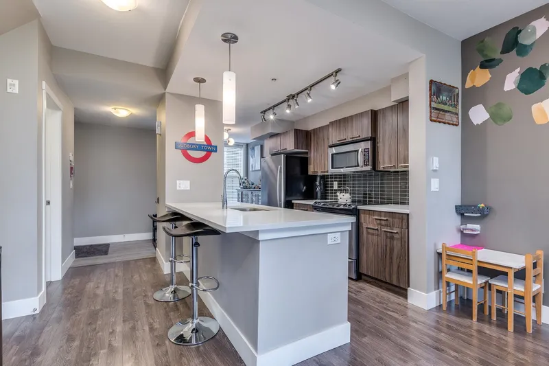 208 2110 ROWLAND STREET - photo 4 of 25