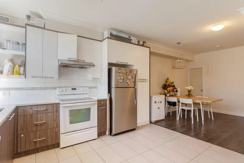 107 7533 GILLEY AVENUE - photo 1 of 17