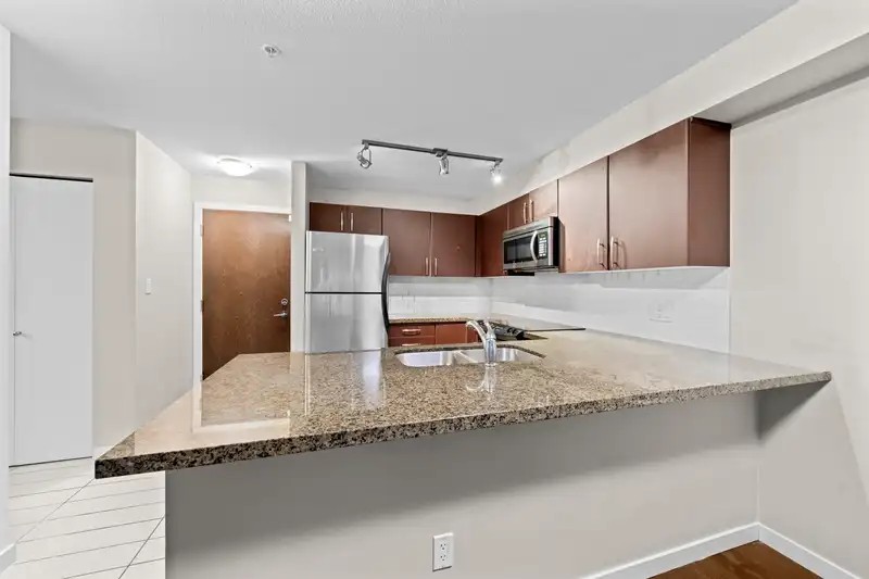 209 7337 MACPHERSON AVENUE - photo 1 of 20