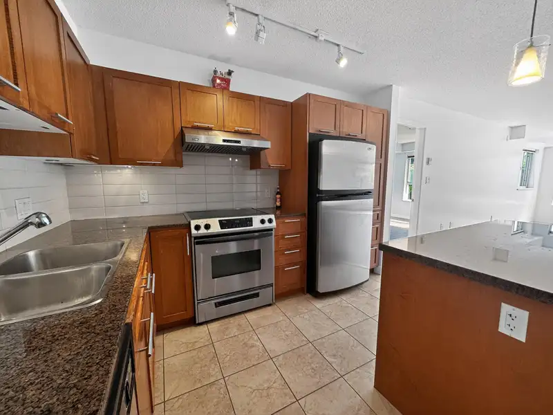 207 19673 MEADOW GARDENS WAY - photo 1 of 39
