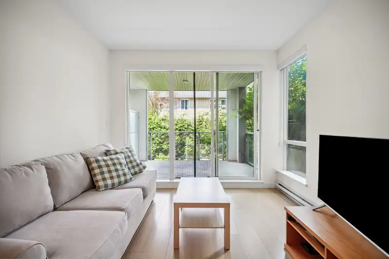 206 5460 BROADWAY - photo 1 of 33