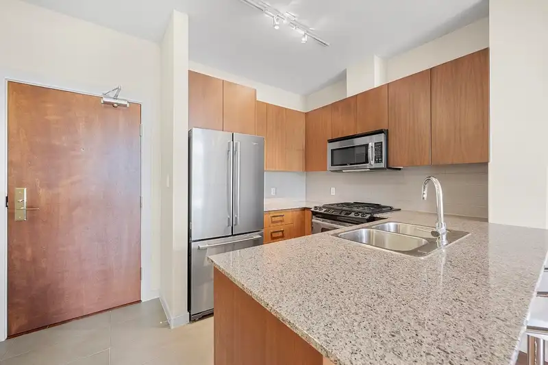 409 5775 IRMIN STREET - photo 2 of 28
