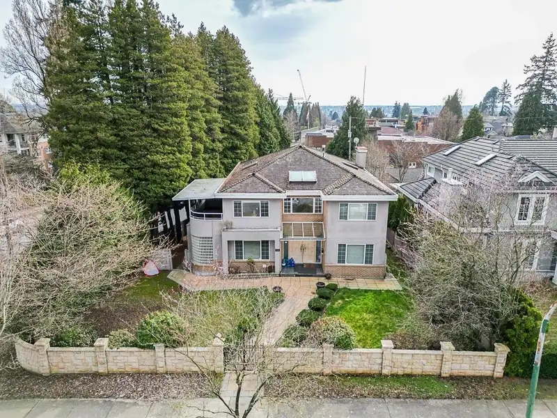 1018 W 58TH AVENUE - photo 1 of 3