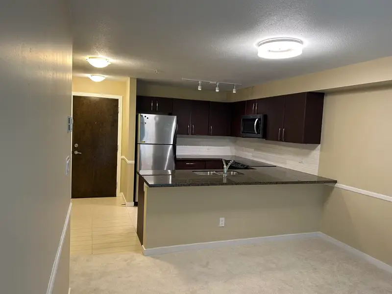 205 7337 MACPHERSON AVENUE - photo 2 of 10