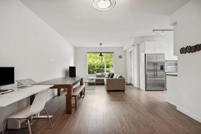 107 3138 RIVERWALK AVENUE - photo 1 of 18