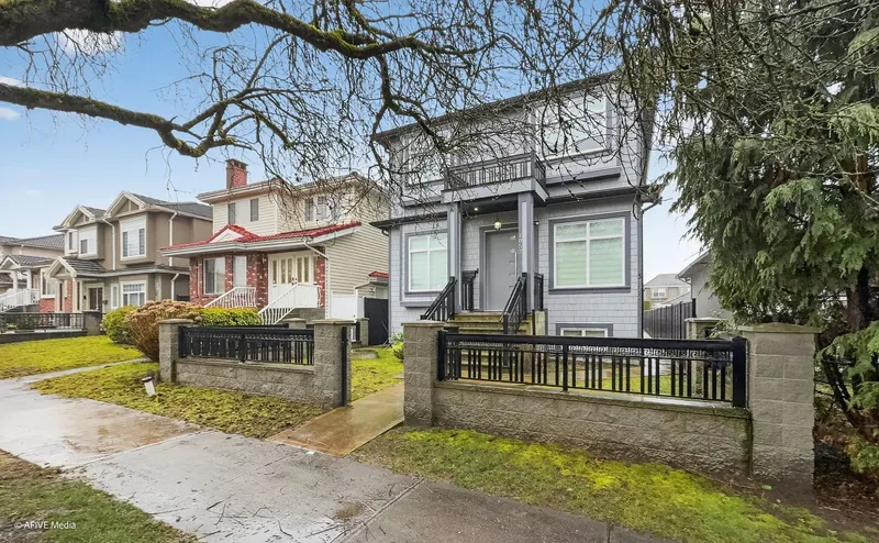 1052 E 50TH AVENUE - photo 1 of 25