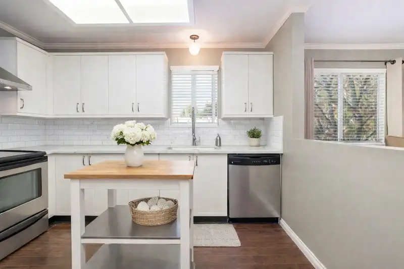 205 7840 MOFFATT ROAD - photo 1 of 6