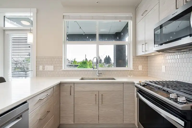 205 2120 GLADWIN ROAD - photo 1 of 29