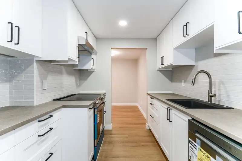 207 7295 MOFFATT ROAD - photo 4 of 32