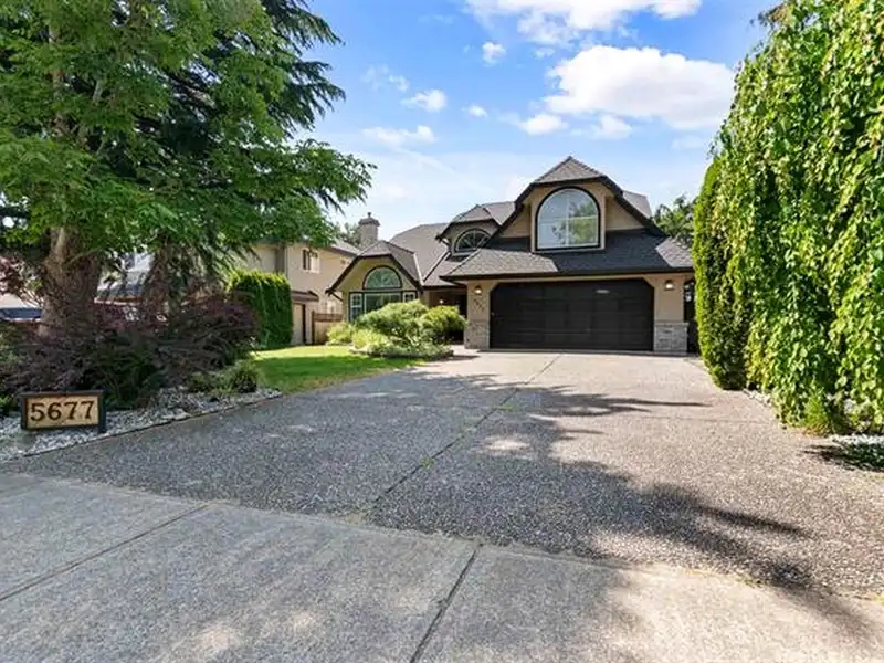 5677 185 STREET - photo 3 of 40