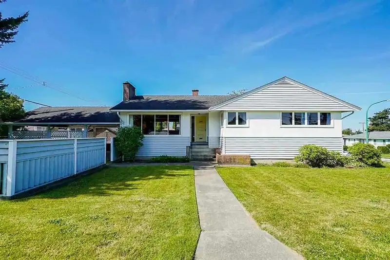 7833 COQUITLAM STREET - photo 1 of 14
