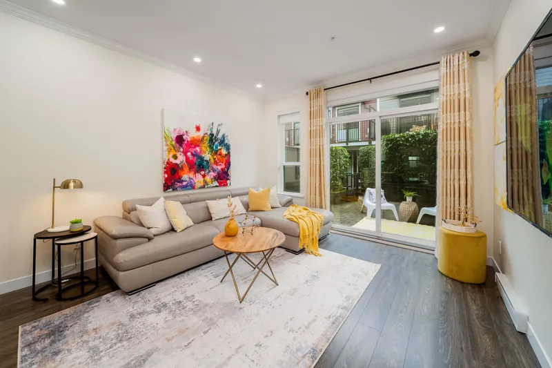 17 7039 MACPHERSON AVENUE - photo 1 of 25