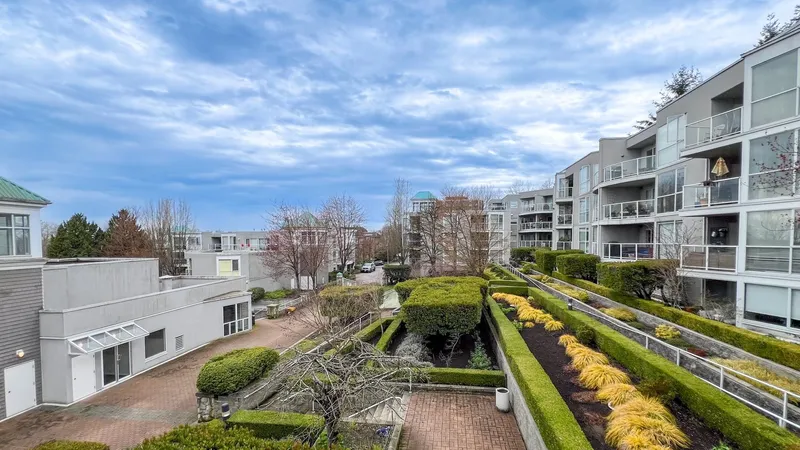 205 8430 JELLICOE STREET - photo 1 of 21