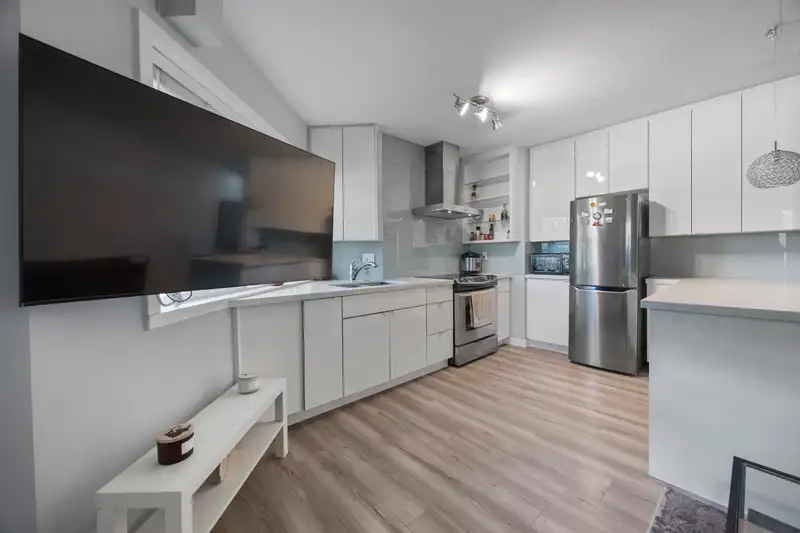 106 1988 E 37TH AVENUE - photo 1 of 15