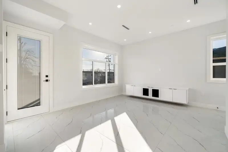 1328 E 64TH AVENUE - photo 3 of 31