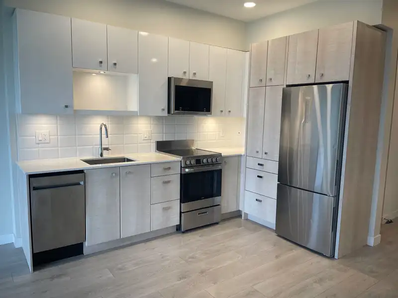 207 10838 WHALLEY BOULEVARD - photo 3 of 36