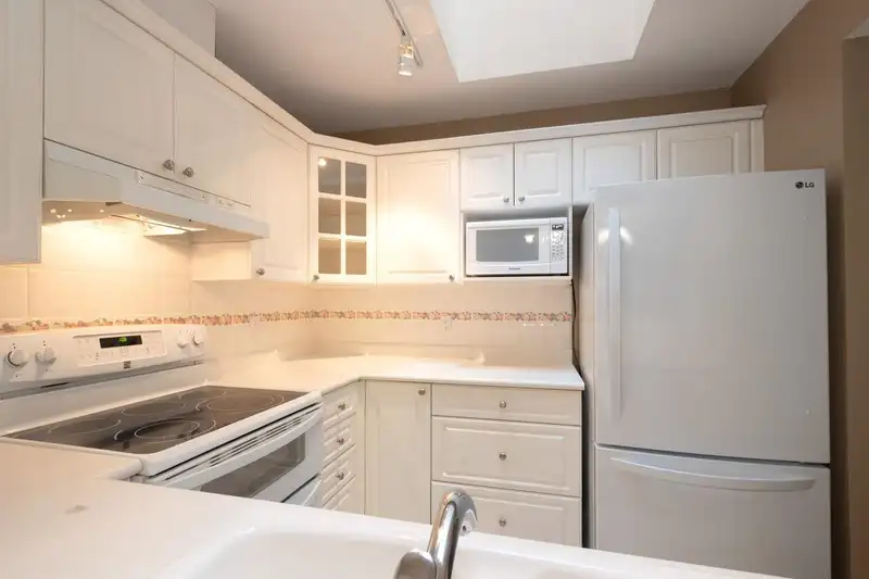 405 3658 BANFF COURT - photo 4 of 36