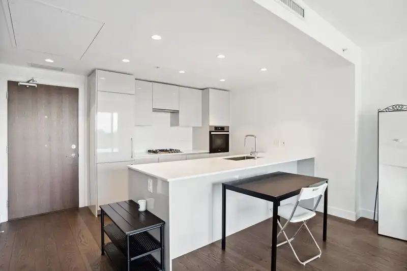 1208 5766 GILBERT ROAD - photo 2 of 27