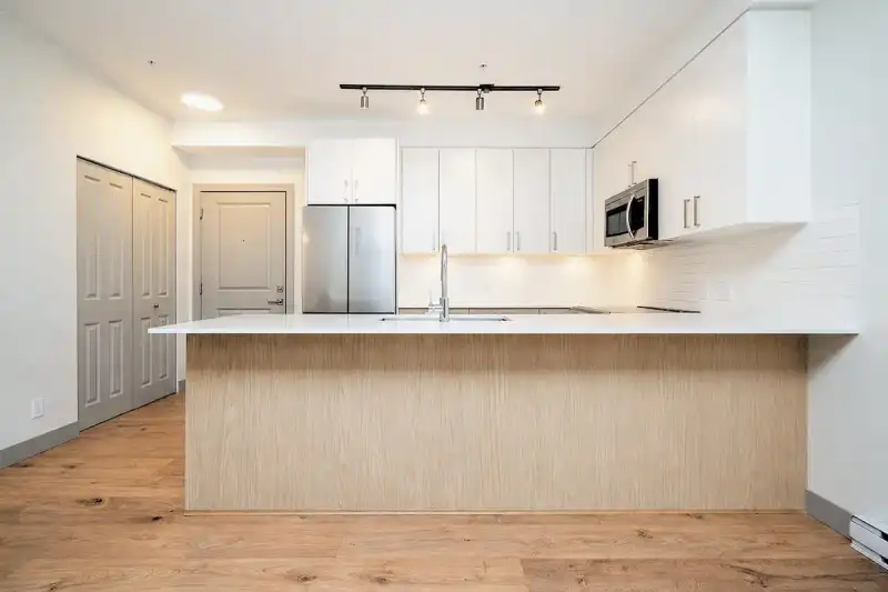 210 6968 ROYAL OAK AVENUE - photo 1 of 21