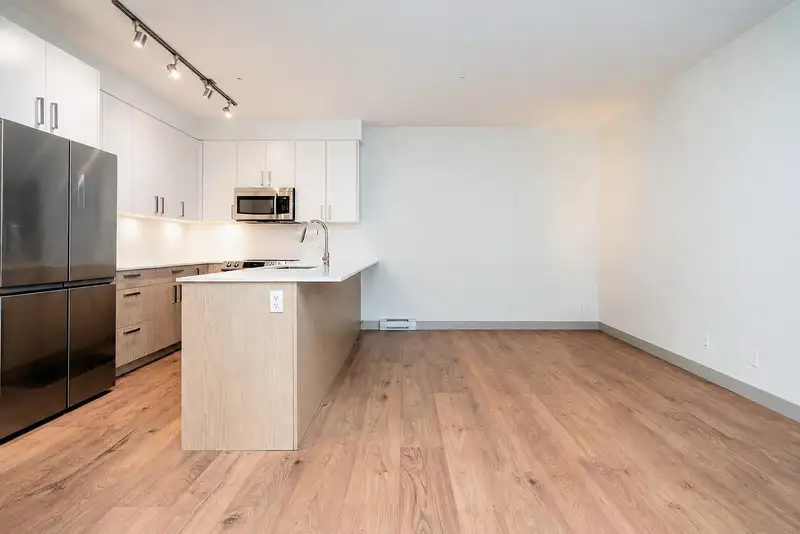 210 6968 ROYAL OAK AVENUE - photo 2 of 21