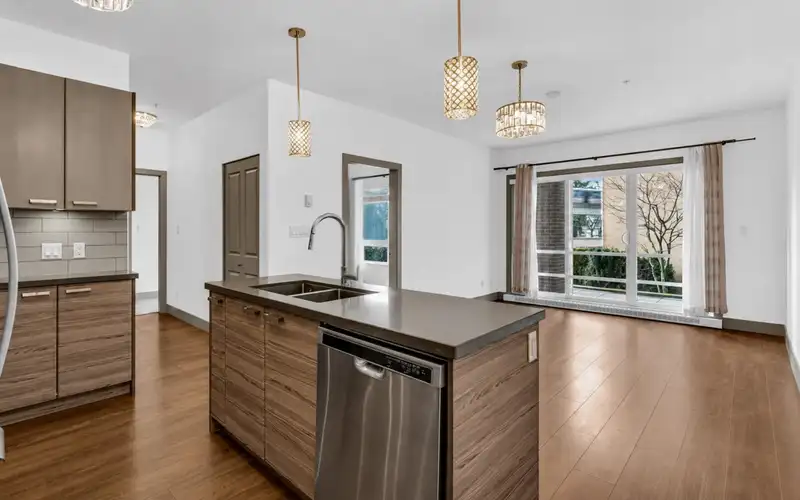 103 6875 DUNBLANE AVENUE - photo 1 of 25