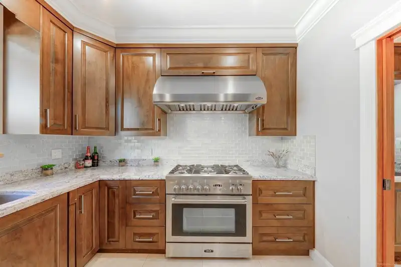 1307 W 46TH AVENUE - photo 4 of 39