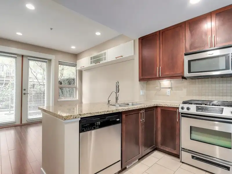 319 E 15TH STREET - photo 1 of 18
