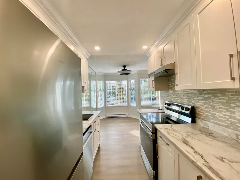 115 7591 MOFFATT ROAD - photo 4 of 14