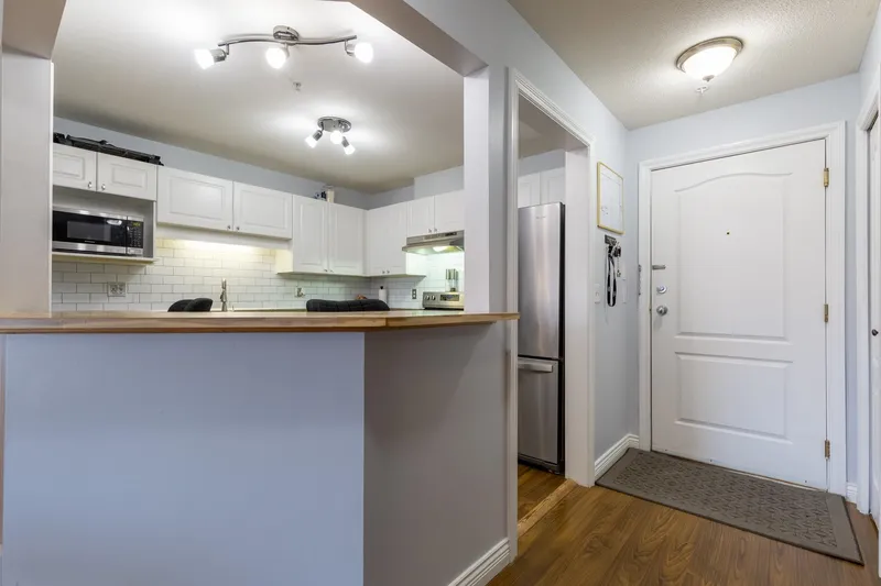 201 5765 GLOVER ROAD - photo 3 of 25