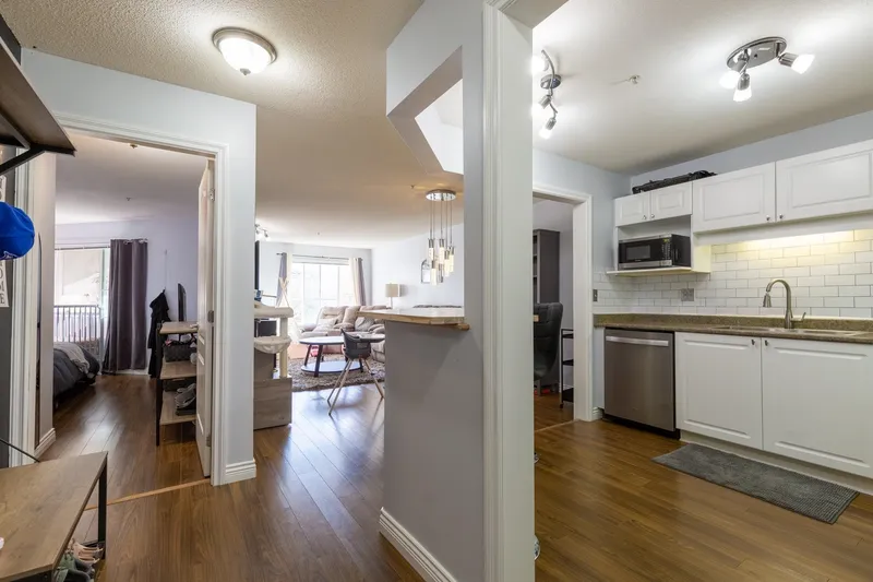 201 5765 GLOVER ROAD - photo 4 of 25