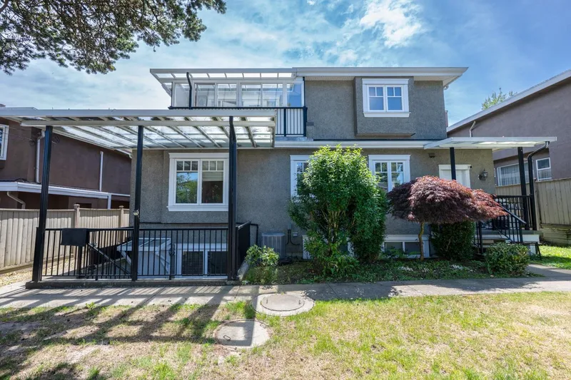 1045 W 50TH AVENUE - photo 4 of 25