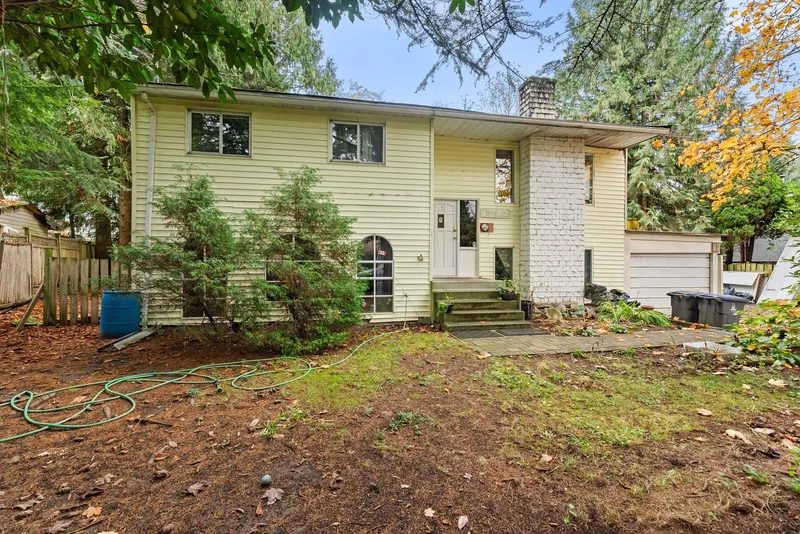 7048 140A STREET - photo 1 of 21