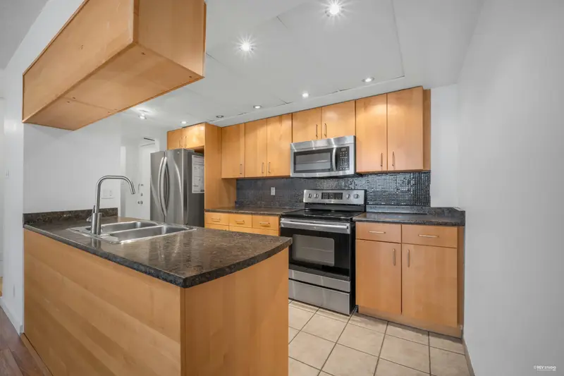 2402 9521 CARDSTON COURT - photo 4 of 24