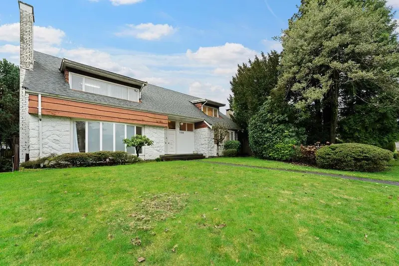 1042 W 48TH AVENUE - photo 1 of 16